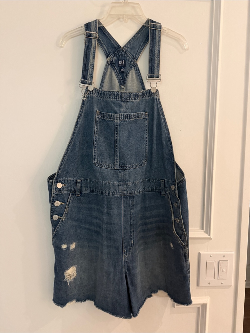 GAP Denim women’s Distressed Denim Short Overalls in Faded Blue